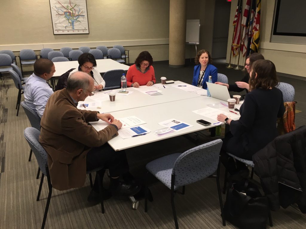 CBO focus group members sitting around table