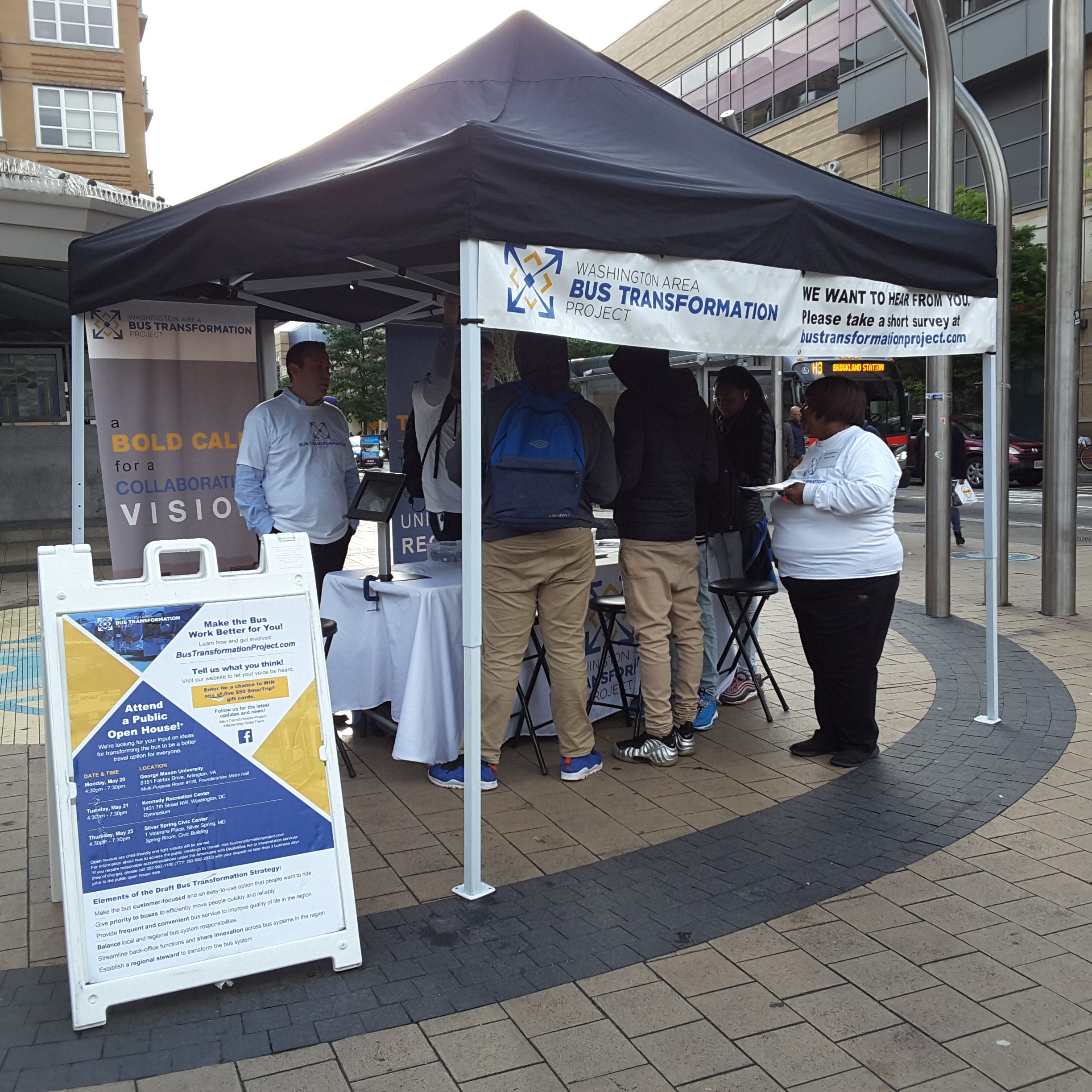 Event booth with people at the Columbia Heights Metro Station
