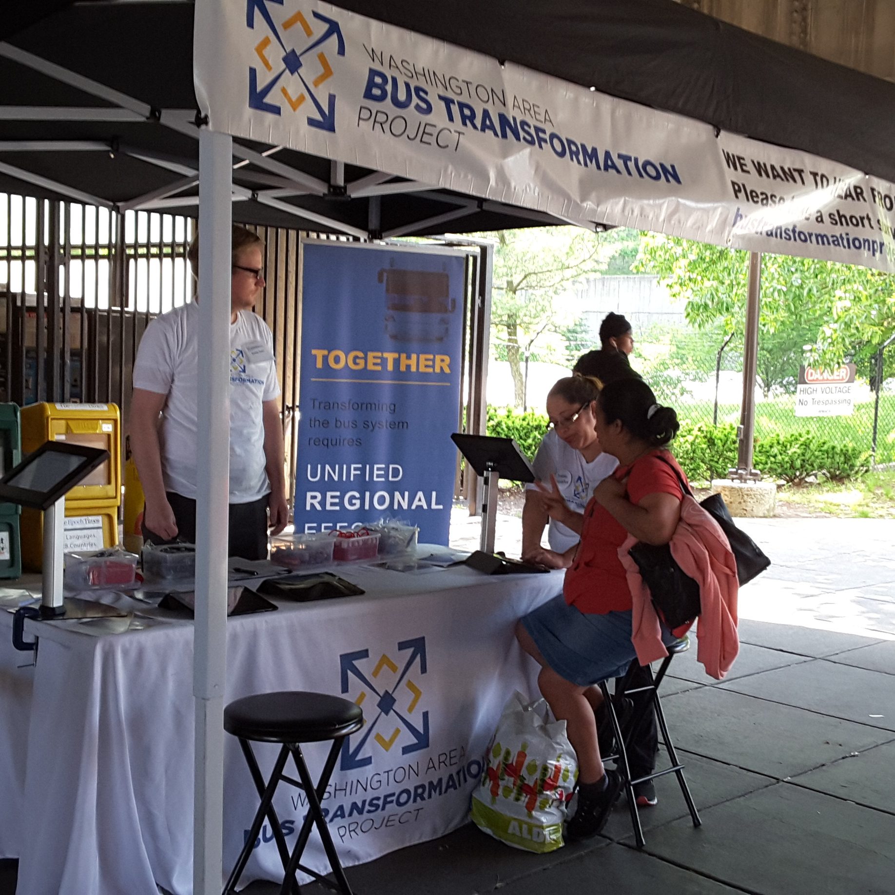 Event booth with people at the Fort Totten Metro Station